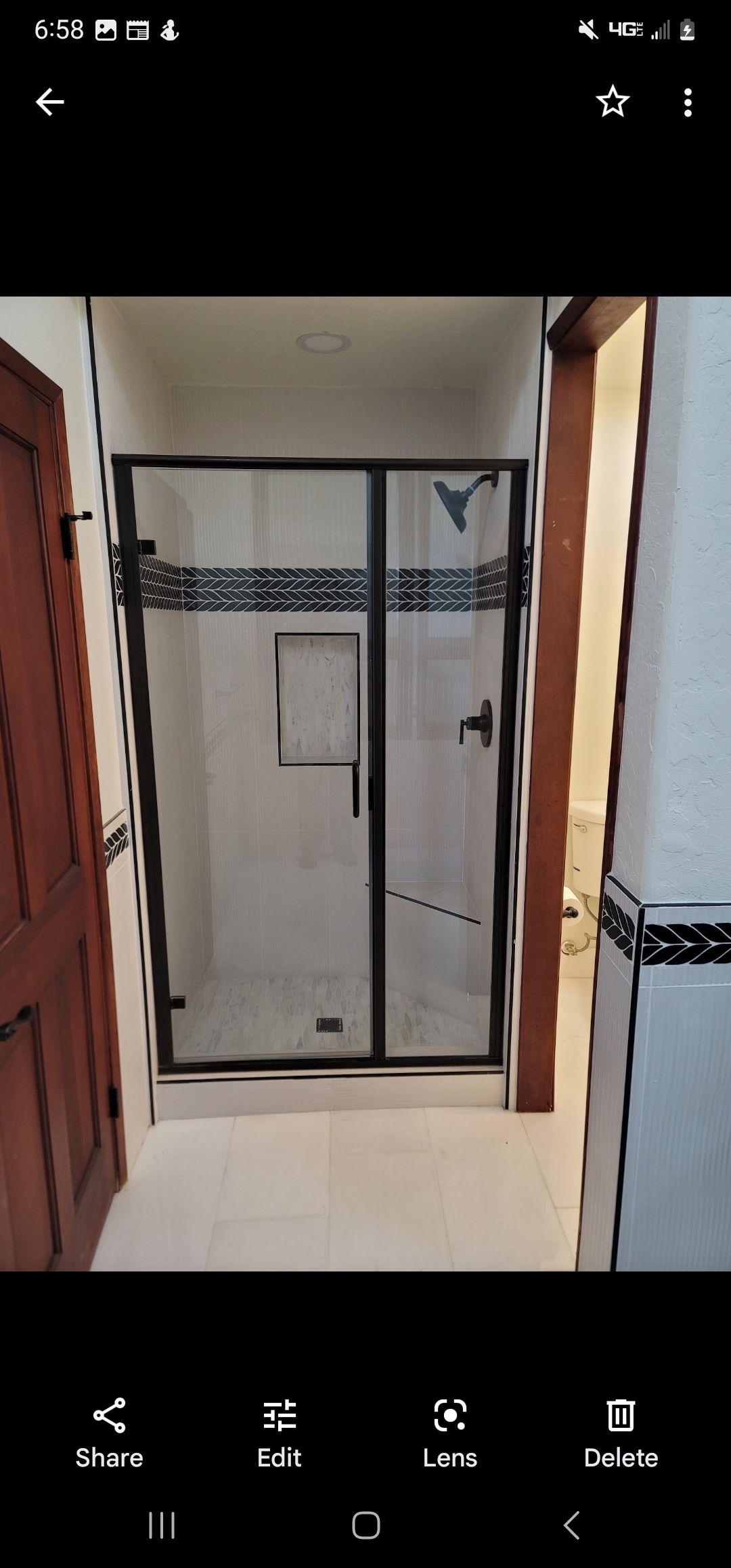 Renovated bathroom with custom tile